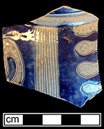 Gray-bodied salt glaze stoneware hollow (mug or jug) with engraved (incised) foliage outlined in cobalt-blue painted under the glaze. Lot number: 18CV60-1.429., Complete vessels with similar motifs have been dated circa 1720.